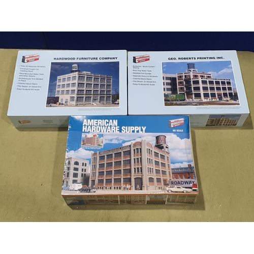 377 - Three boxed Walthers Cornerstone American H0 Lineside Building Kits comprising American Hardware Sup... 
