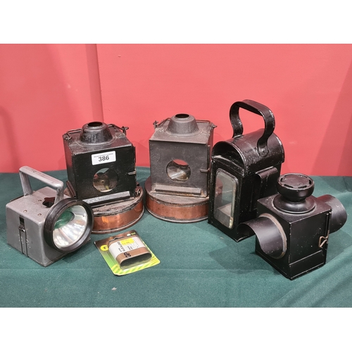 386 - A pair of Railway Oil Lamps, one stamped 'GWR' to filler cap, the other 'BR(W)', another black paint... 