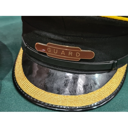 389 - A British Railway Cap with totem badge and a Guards Cap