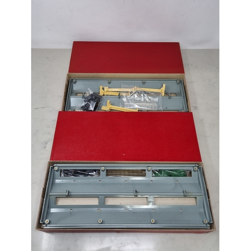 50 - A boxed Hornby Dublo 5005 Engine Shed and 5006 Extension Kit, both contents in sealed packets, boxes... 