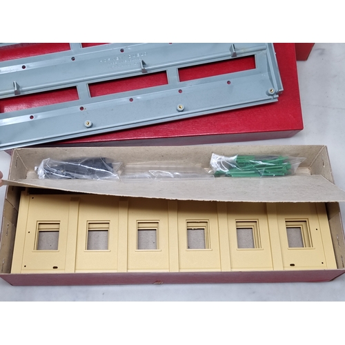 50 - A boxed Hornby Dublo 5005 Engine Shed and 5006 Extension Kit, both contents in sealed packets, boxes... 