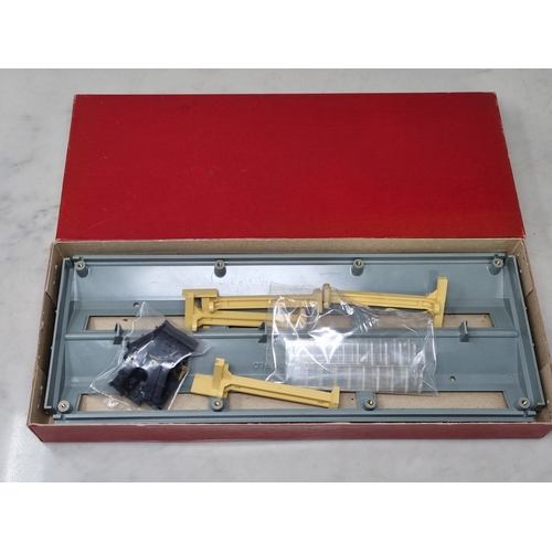 50 - A boxed Hornby Dublo 5005 Engine Shed and 5006 Extension Kit, both contents in sealed packets, boxes... 