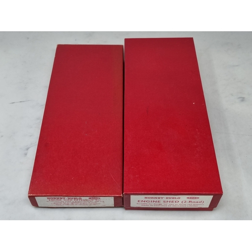 50 - A boxed Hornby Dublo 5005 Engine Shed and 5006 Extension Kit, both contents in sealed packets, boxes... 