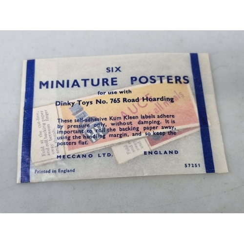 82 - A boxed Dinky Toys 765 Road Hoarding ideal for the Hornby Dublo layout, unused with paper stickers s... 