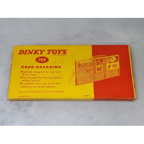 82 - A boxed Dinky Toys 765 Road Hoarding ideal for the Hornby Dublo layout, unused with paper stickers s... 