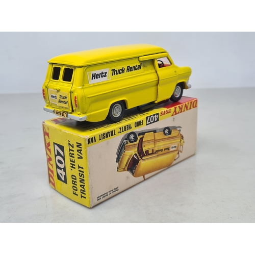 460 - A boxed Dinky Toys No.407 Ford 'Hertz' Transit Van, Nr M, box VG, has stain on one side