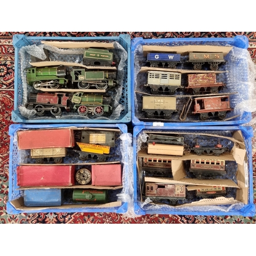 Four crates containing Hornby 0 gauge clockwork Locomotives, Carriages ...