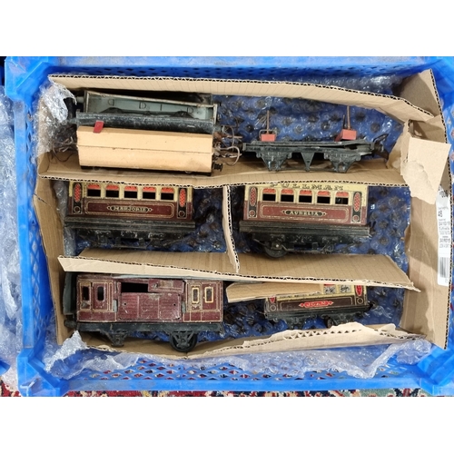 Four crates containing Hornby 0 gauge clockwork Locomotives, Carriages ...