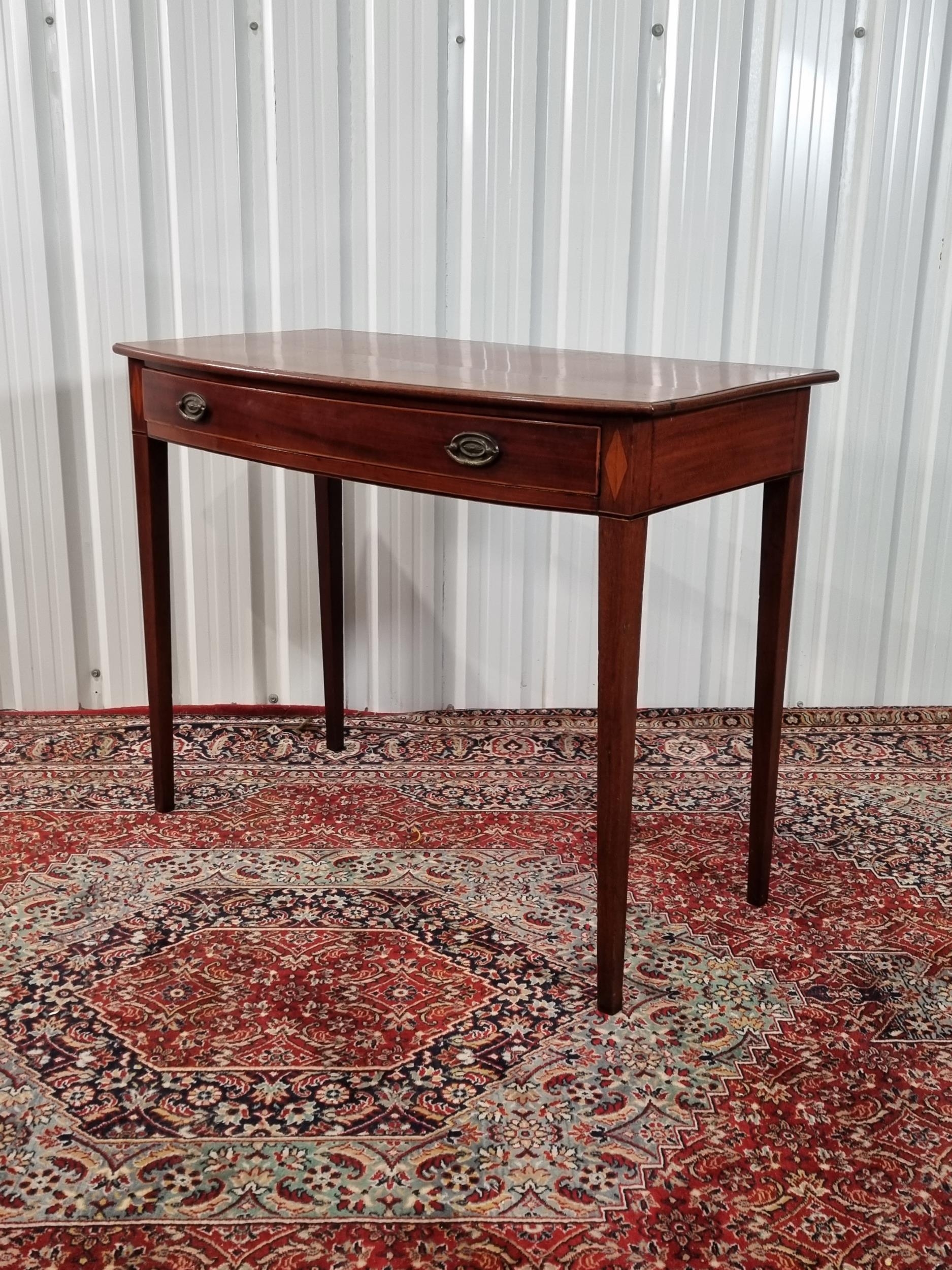 A mahogany Bow front Side Table, with satinwood stringing, single ...