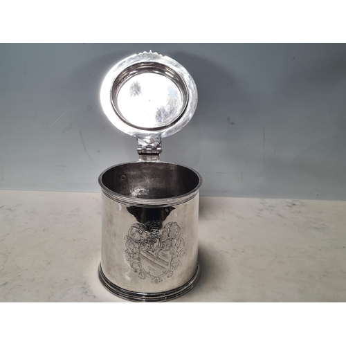 101 - A Charles II silver lidded Tankard with scroll thumb piece, flat section lid, engraved large armoria... 