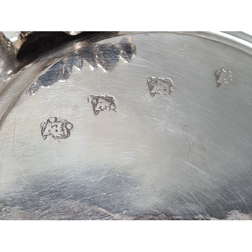 102 - A Charles 11 silver plain lidded Tankard with double scroll thumb piece, flat section lid, London 16... 