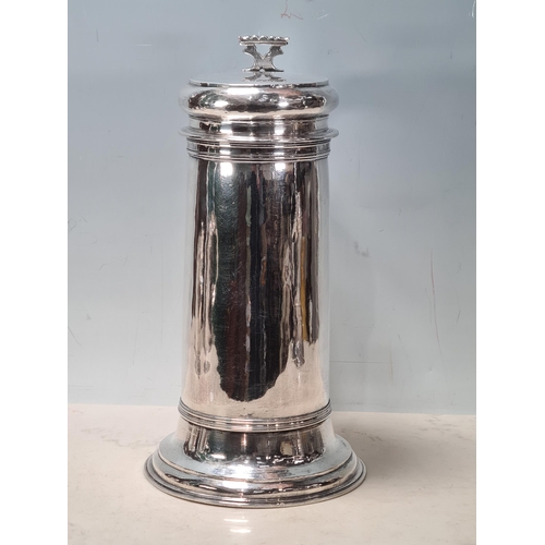 103 - A William & Mary large silver Flagon with pierced scroll thumb piece, flat lid, scroll handle, Londo... 