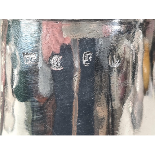 103 - A William & Mary large silver Flagon with pierced scroll thumb piece, flat lid, scroll handle, Londo... 