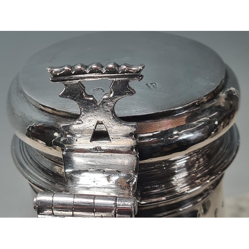 103 - A William & Mary large silver Flagon with pierced scroll thumb piece, flat lid, scroll handle, Londo... 