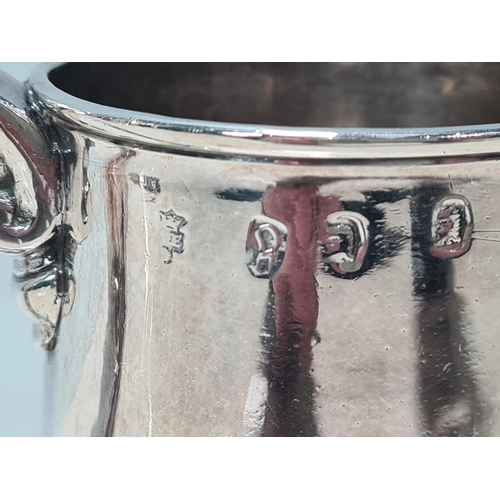 104 - A George I silver straight sided Half Pint Mug with scroll handle, engraved initials under T over I*... 