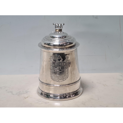 105 - A George II silver lidded Tankard with scroll thumb piece, engraved shield shape coat of arms surmou... 