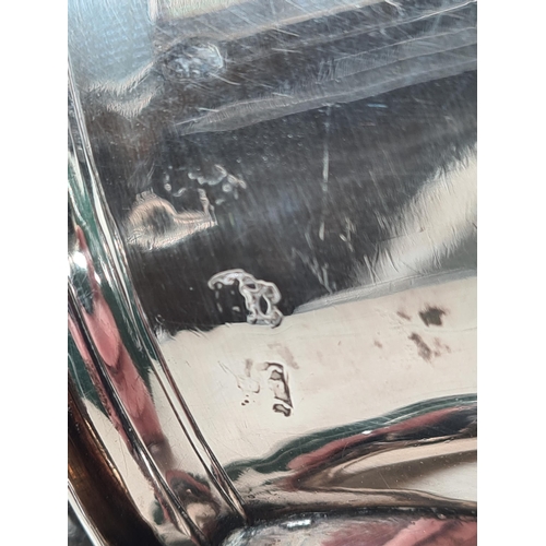105 - A George II silver lidded Tankard with scroll thumb piece, engraved shield shape coat of arms surmou... 