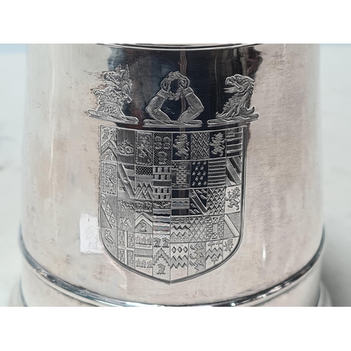 105 - A George II silver lidded Tankard with scroll thumb piece, engraved shield shape coat of arms surmou... 