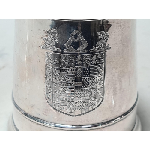 105 - A George II silver lidded Tankard with scroll thumb piece, engraved shield shape coat of arms surmou... 