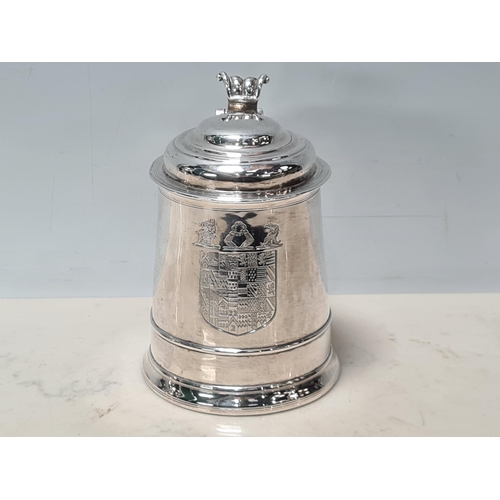 105 - A George II silver lidded Tankard with scroll thumb piece, engraved shield shape coat of arms surmou... 