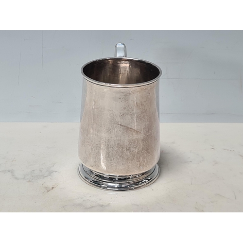 106 - A George II silver Mug with scroll handle, London 1731, maker: Francis Spilsbury, 195gms