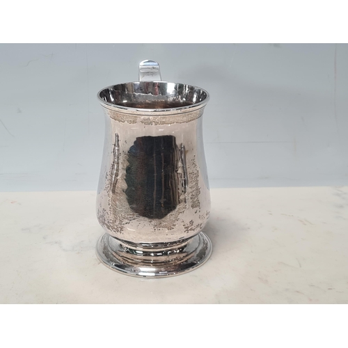 107 - A George II silver Pint Mug of bellied form, scroll handle, Newcastle 1757, maker: John Langlands, 3... 