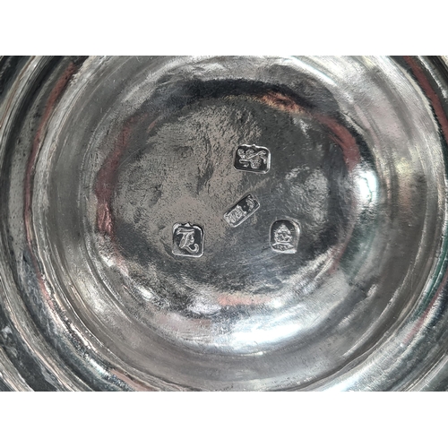 108 - A George III silver lidded baluster Tankard with pierced thumb piece, domed lid scroll handle engrav... 