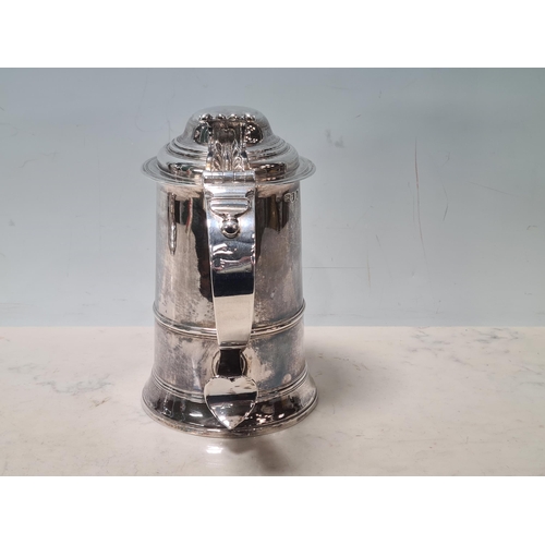 109 - A George III silver straight sided lidded Tankard with scroll thumb piece, domed id, engraved initia... 
