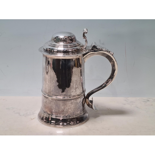 109 - A George III silver straight sided lidded Tankard with scroll thumb piece, domed id, engraved initia... 