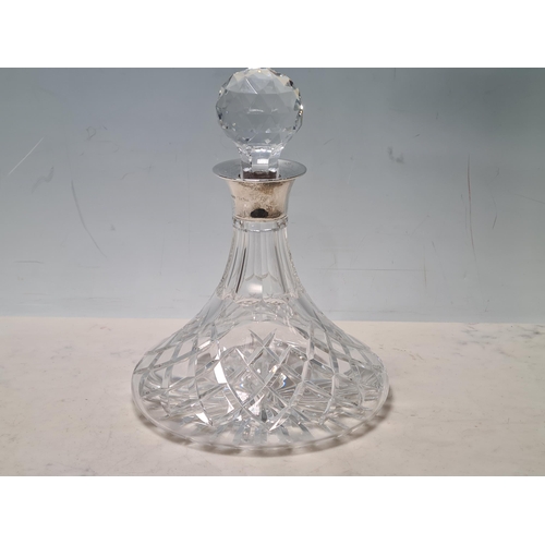 111 - A modern silver mounted cut glass Ship's Decanter