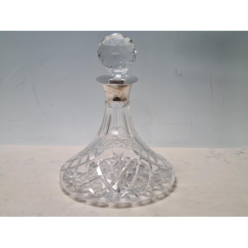 111 - A modern silver mounted cut glass Ship's Decanter