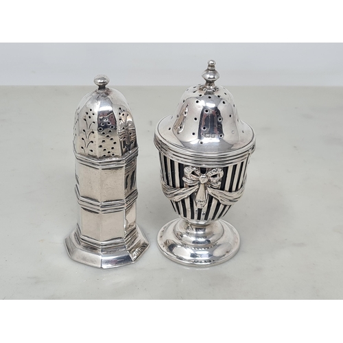 114 - An Edward VII silver urn shaped Pepperette with ribbon and swag decoration, Chester 1907, and an oct... 