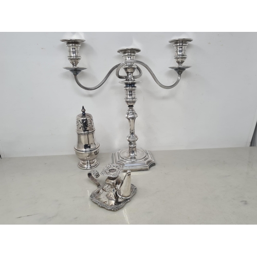 115 - A plated Taperstick and Snuffer with gadroon and scroll rim, a plated Sugar Caster and a two branch ... 