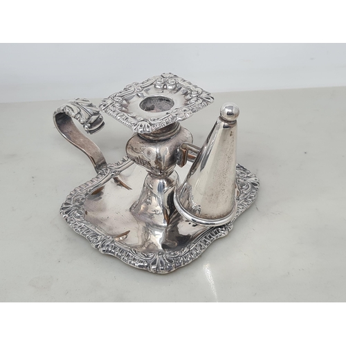 115 - A plated Taperstick and Snuffer with gadroon and scroll rim, a plated Sugar Caster and a two branch ... 