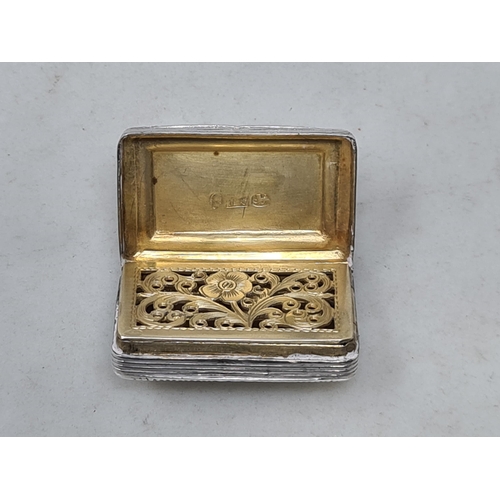 119 - A George IV silver Vinaigrette with vacant rectangular cartouche, floral grille, Birmingham 1822, ma... 