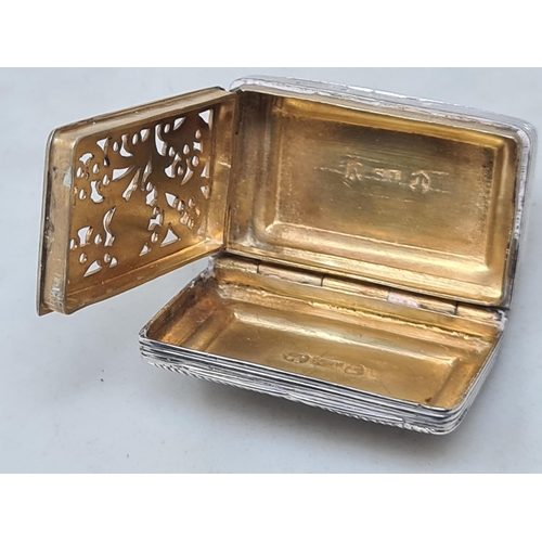119 - A George IV silver Vinaigrette with vacant rectangular cartouche, floral grille, Birmingham 1822, ma... 
