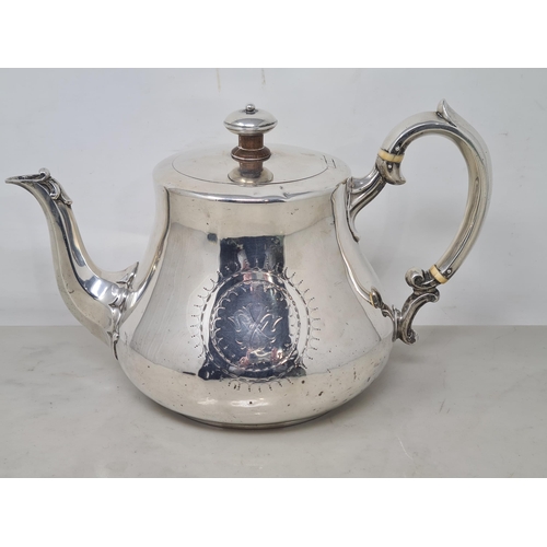 63 - A Victorian silver teapot of bellied form engraved lyre crest and initials within circular cartouche... 