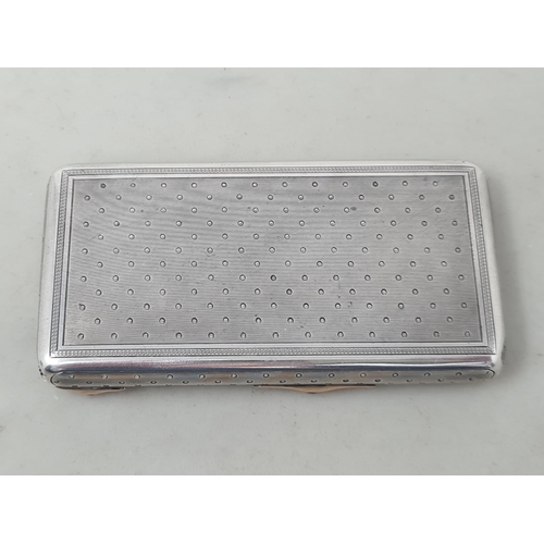 64 - A Russian silver Faberge style combined Cigarette and Vesta Case with engine turned and dot decorati... 