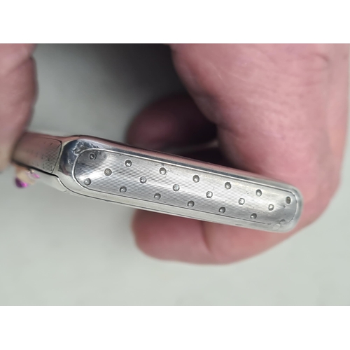 64 - A Russian silver Faberge style combined Cigarette and Vesta Case with engine turned and dot decorati... 