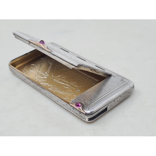 64 - A Russian silver Faberge style combined Cigarette and Vesta Case with engine turned and dot decorati... 