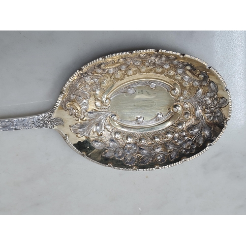 66 - A pair of Edward VII silver and parcel-gilt Fruit Spoons with floral decorated bowls and stems, Lond... 