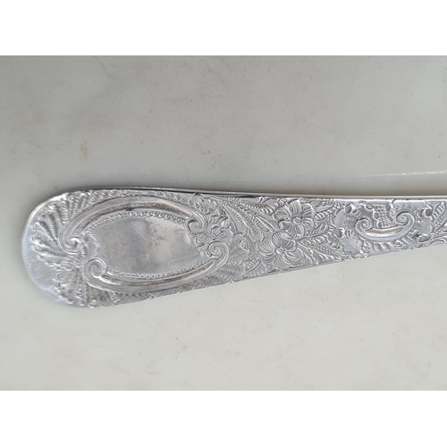 66 - A pair of Edward VII silver and parcel-gilt Fruit Spoons with floral decorated bowls and stems, Lond... 
