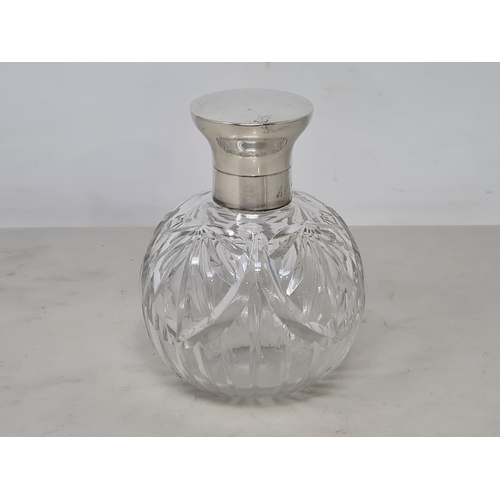 68 - A George V silver lidded cut glass Scent Bottle, Birmingham 1920