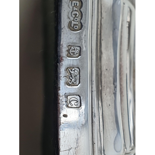 76 - A pair of Edward VII silver Table Candlesticks with knopped stems on shaped square bases, Birmingham... 