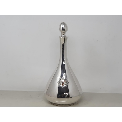 77 - An Eastern silver Bottle and Stopper of bulbous form with enamel Shanghai Russian Regiment insignia,... 