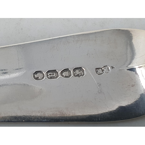 84 - A Victorian silver Basting Spoon fiddle pattern engraved crest, London 1856, 150gms