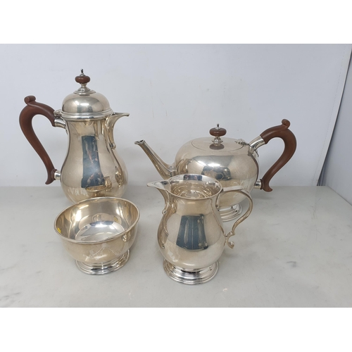 88 - A George VI silver four piece Tea Service of plain circular form, London 1945, 1980gms all in