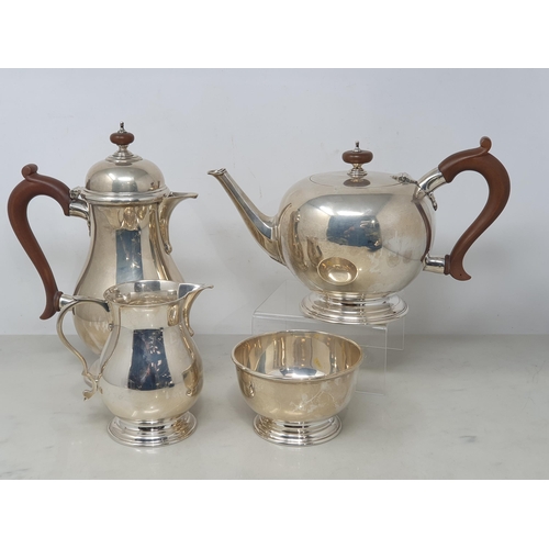 88 - A George VI silver four piece Tea Service of plain circular form, London 1945, 1980gms all in