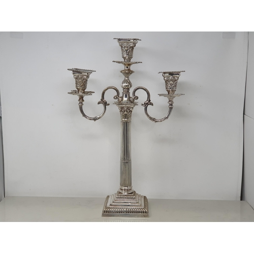 93 - A plated two branch Candelabra with leafage sconces, fluted column on stepped square base with gadro... 