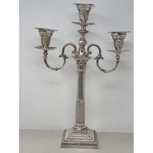 93 - A plated two branch Candelabra with leafage sconces, fluted column on stepped square base with gadro... 